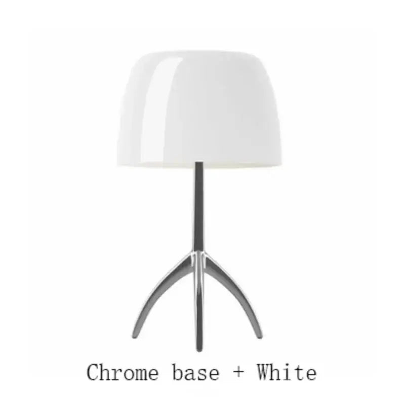 White glossy lampshade on sleek chrome tripod base of decorbites lumiere table lamp for modern bedroom use