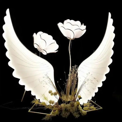 White illuminated angel wings lamp with delicate floral accents decorbites luminescent angel wings for modern decor