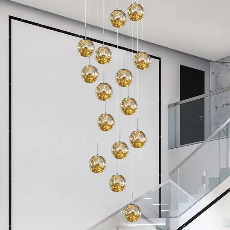 A decorbites luminous glass ball pendant chandelier with amber glowing glass orbs for living and dining room decor