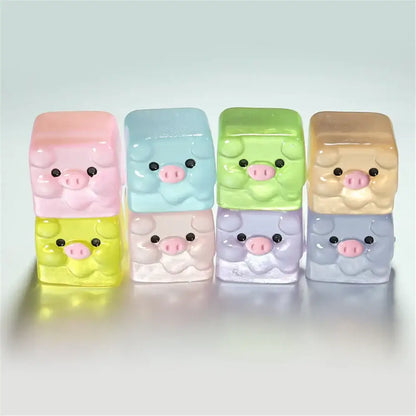 Set of six pastel-colored translucent resin pig figurines with glossy finish from decorbites luminous resin cactus miniatures collection