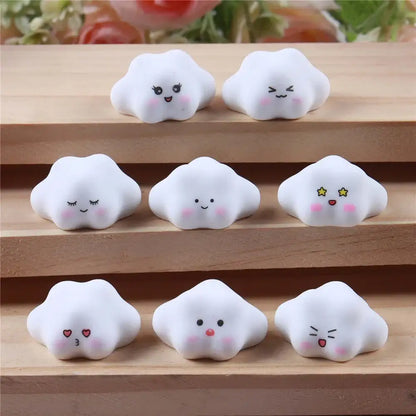 White cloud-shaped stress relievers with pink cheeks in the decorbites luminous resin cactus miniatures set for crafts