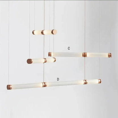 Modern minimalist luna glass tube chandelier with frosted glass tubes and brushed copper end caps for kitchen lighting