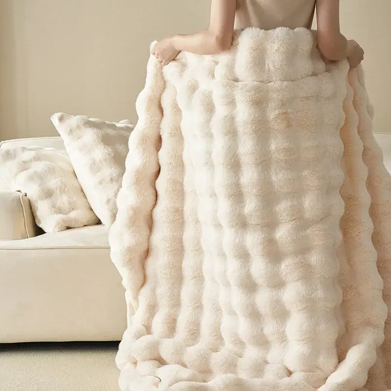 Cream-colored plush decorbites luxe faux rabbit fur throw blanket with ribbed texture cozy sofa cover for autumn winter