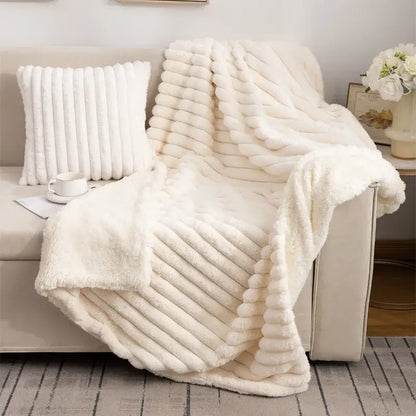 Cream-colored decorbites luxe double-layer blanket with ribbed faux-rabbit fur texture for cozy autumn-winter comfort