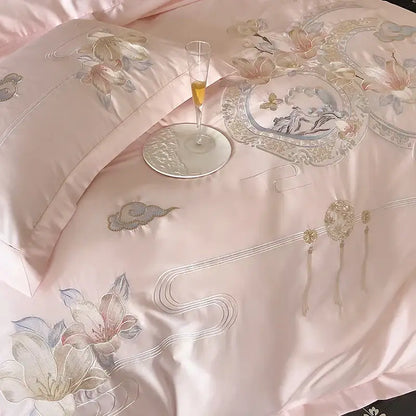 Pink satin bedding set with intricate gold and silver floral embroidery from decorbites luxe floral bird collection