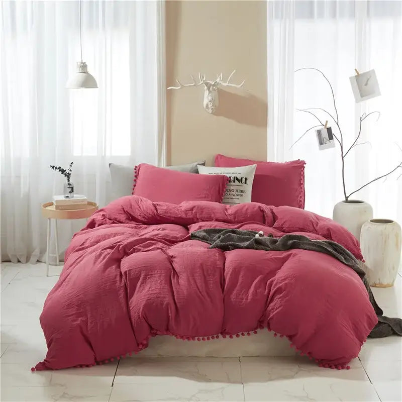 Rustic pink cotton bedding set with pom-pom trim from decorbites luxe furball tasseled queen king duvet cover