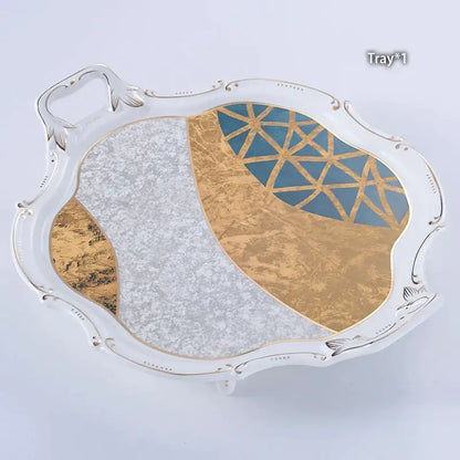 Elegant white ceramic serving tray with gold inlay and ornate silver handles from DecorBites Luxe Gold coffee set