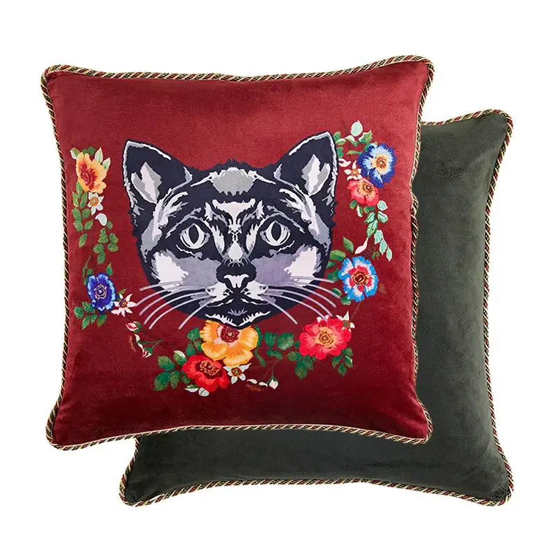 Red velvet decorative pillow cover with embroidered cat face and colorful floral patterns for elegant home accent