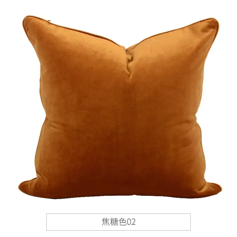 A plush caramel square cushion with soft velvet texture in decorbites luxe italy velvet pillowslip for living room sofa