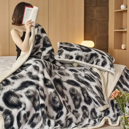 Soft plush black and white leopard-print decorbites luxe leopard rabbit fur blanket with cream fleece lining for office and sofa
