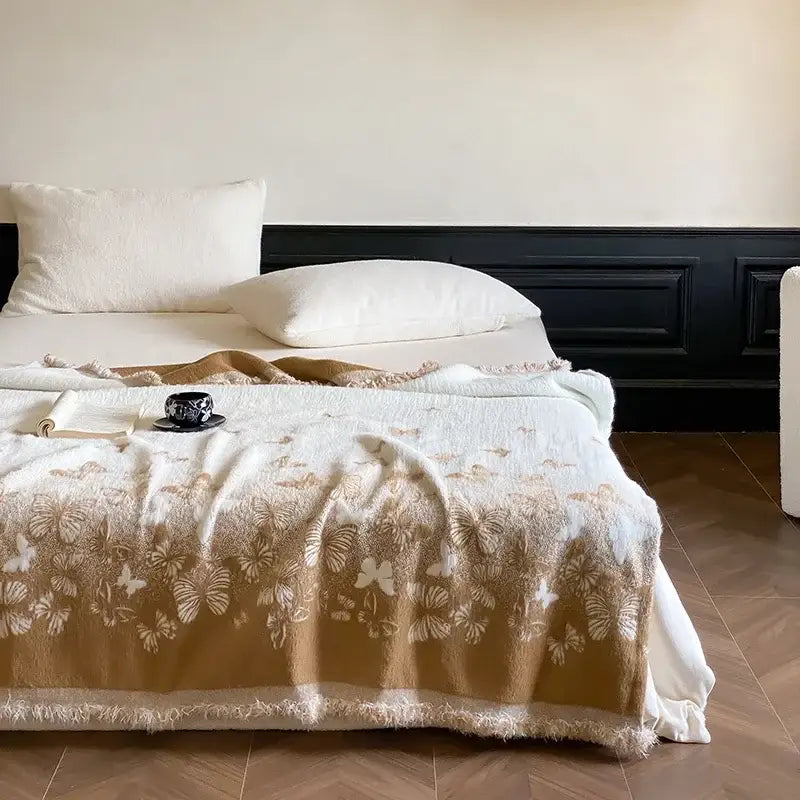 Decorbites luxe mink fur jacquard throw in cream with delicate beige and white butterfly pattern for cozy warmth and style