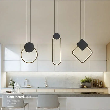 Three modern minimalist black and gold pendant lights with geometric frames for decorbites luxe nordic circle lamp