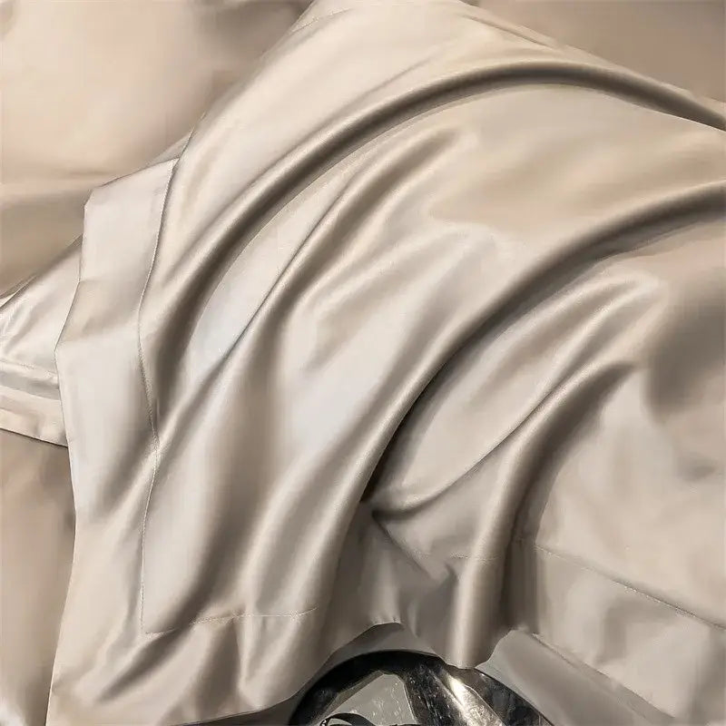 Beige satin pillowcase with smooth glossy texture and subtle sheen in decorbites luxurious 1000tc egyptian cotton bedding set including fitted sheet and duvet cover