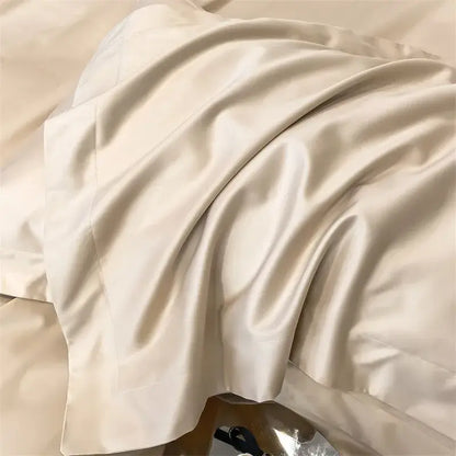 Cream-colored satin pillowcase from decorbites™ luxurious 1000tc egyptian cotton bedding set with smooth glossy finish and soft folds