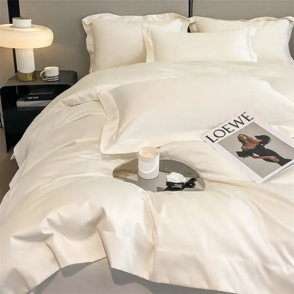 Cream-colored satin duvet cover and fitted sheet with elegant pleated edges in DecorBites™ 1000TC egyptian cotton set