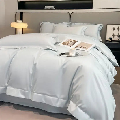 Light blue satin duvet cover set with matching pillowcases featuring stitched detailing from DecorBites 1000TC cotton bedding set