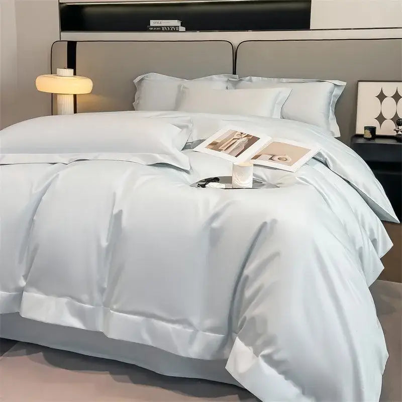 Light blue satin duvet cover set by DecorBites featuring smooth glossy finish and elegant stitched detailing