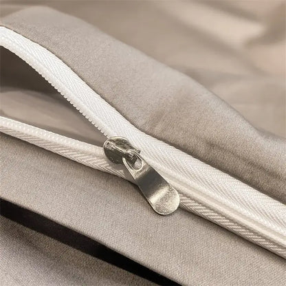 Silver zipper with metallic pull tab on the seam of light gray decorbites™ luxurious 1000tc egyptian cotton duvet cover