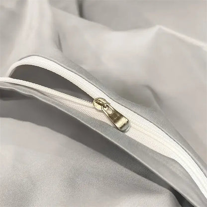 Silver-toned zipper with metallic pull tab on soft white fabric of decorbites luxurious 1000tc egyptian cotton duvet cover
