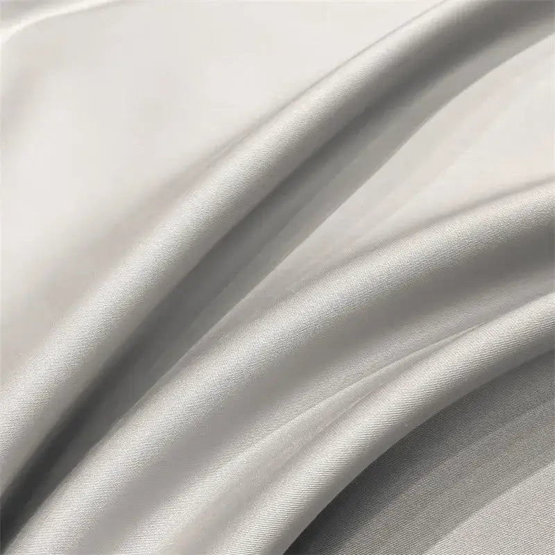 A smooth silvery-gray satin piece duvet cover from decorbites™ luxurious 1000tc egyptian cotton bedding set