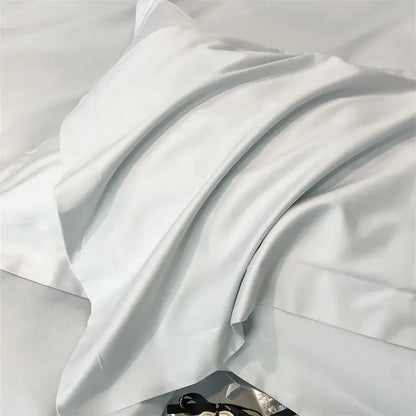A smooth white satin pillowcase from decorbites™ luxurious 1000tc egyptian cotton bedding set with subtle sheen