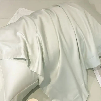 A soft off-white satin pillowcase with smooth lustrous texture from DecorBites™ 1000TC Egyptian cotton bedding set