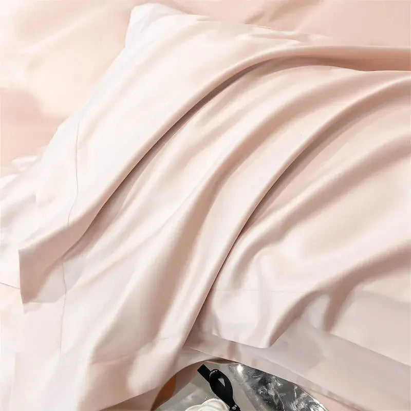 A soft blush pink satin pillowcase with lustrous finish from decorbites™ luxurious 1000tc egyptian cotton bedding set including duvet cover and fitted sheet