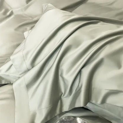 A soft light gray satin pillowcase with a glossy finish included in the decorbites™ luxurious 1000tc egyptian cotton bedding set with duvet cover and fitted sheet