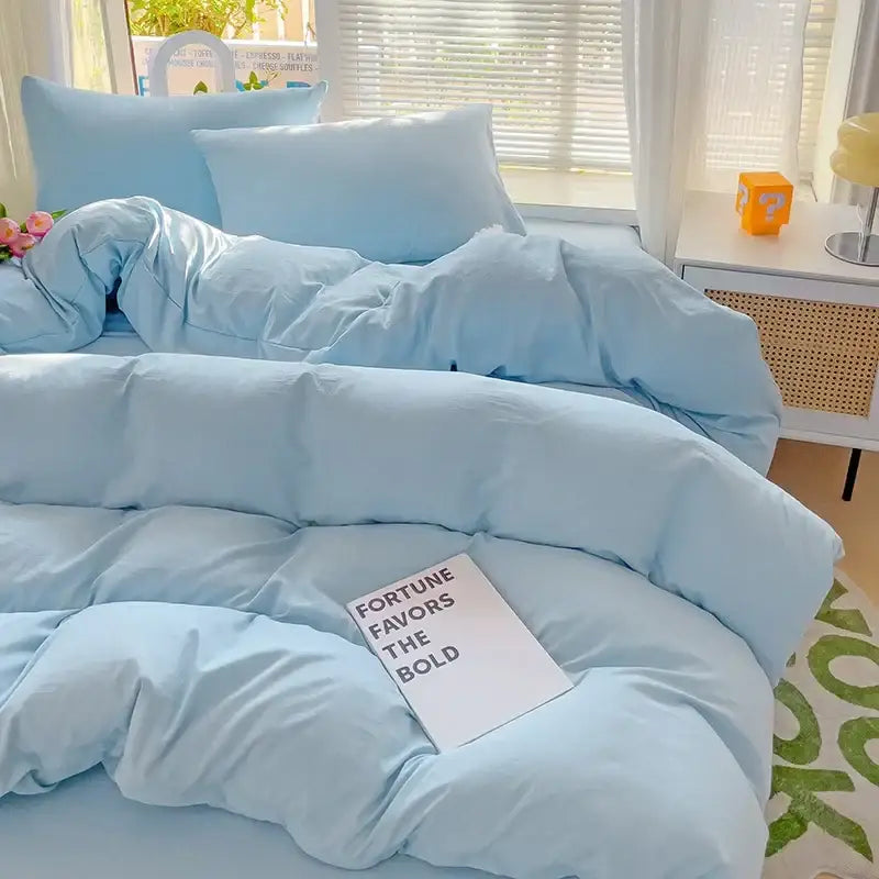 Decorbites luxurious light blue plush quilted 4-piece cotton bedding set with matching pillows for bedroom comfort