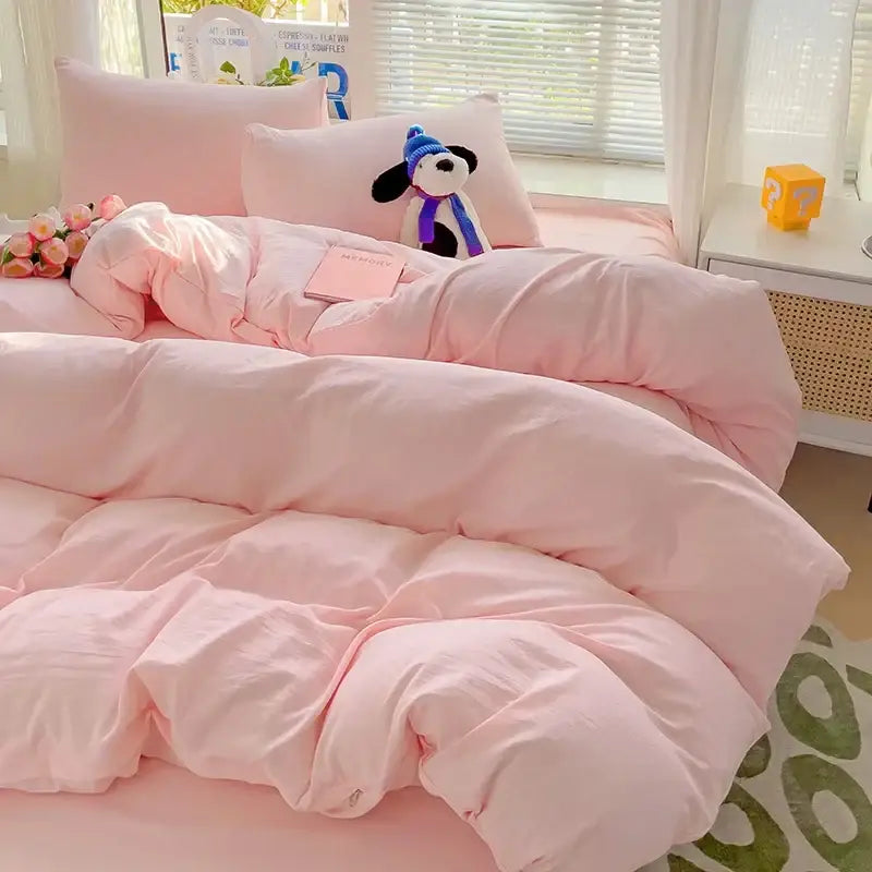 Decorbites luxurious 4-piece cotton bedding set in pink quilted plush fabric with matching pillows for comfortable sleep