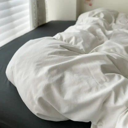 Decorbites™ luxurious cotton bedding set featuring a soft white cotton duvet cover with gentle folds for single and couple beds