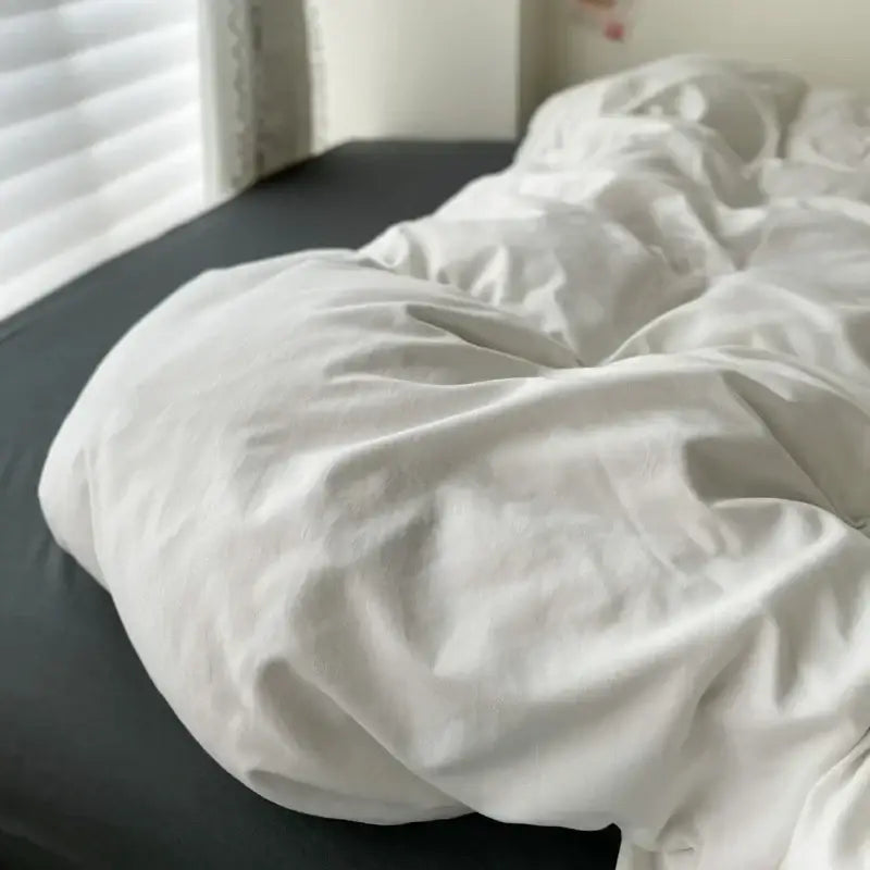 Decorbites™ luxurious cotton bedding set featuring a soft white cotton duvet cover with gentle folds for single and couple beds