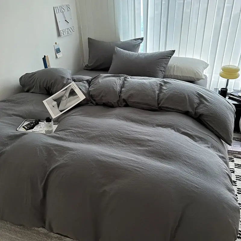 Decorbites™ luxurious cotton bedding set in cozy textured gray with soft fabric and matching pillows neatly arranged on bed