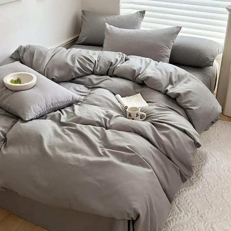 Gray duvet bedding set with matching pillows featuring soft smooth fabric in decorbites™ cotton bedding set