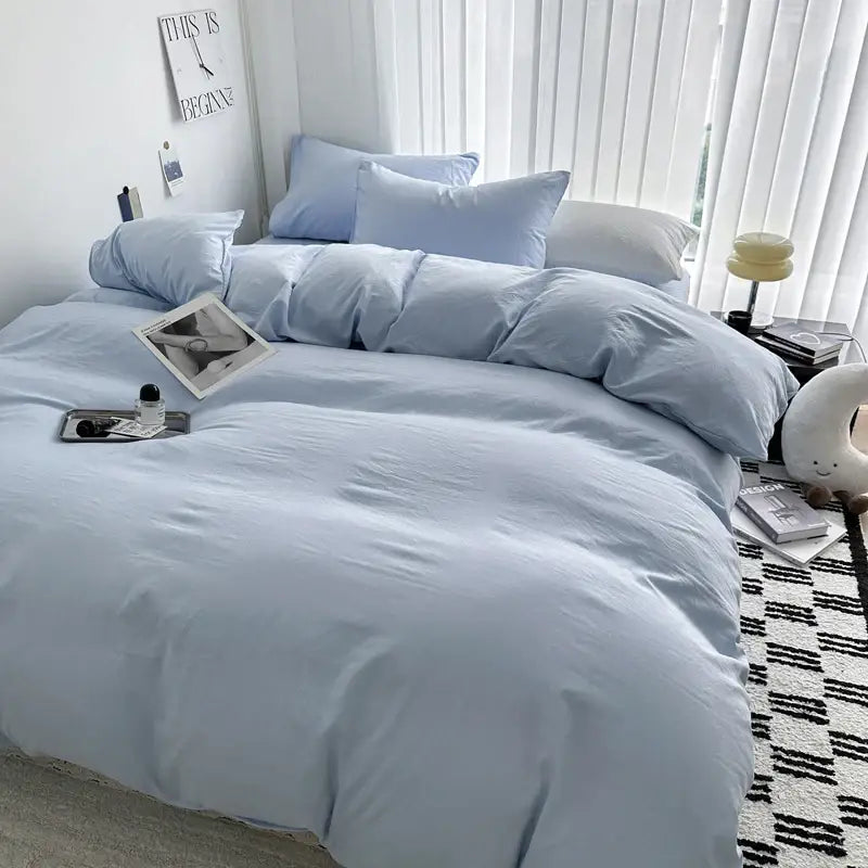 Decorbites luxurious light blue cotton bedding set with soft pillows and cozy texture in various sizes
