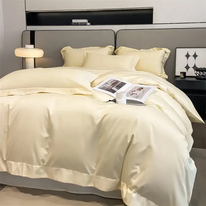 Cream-colored satin duvet cover set with ruffled edges made of egyptian cotton 1000tc by decorbites luxurious bedding