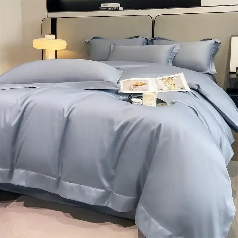 Light blue satin duvet cover set with matching pillows featuring smooth glossy finish and elegant stitched edges by decorbites luxurious egyptian cotton bedding set 1000tc