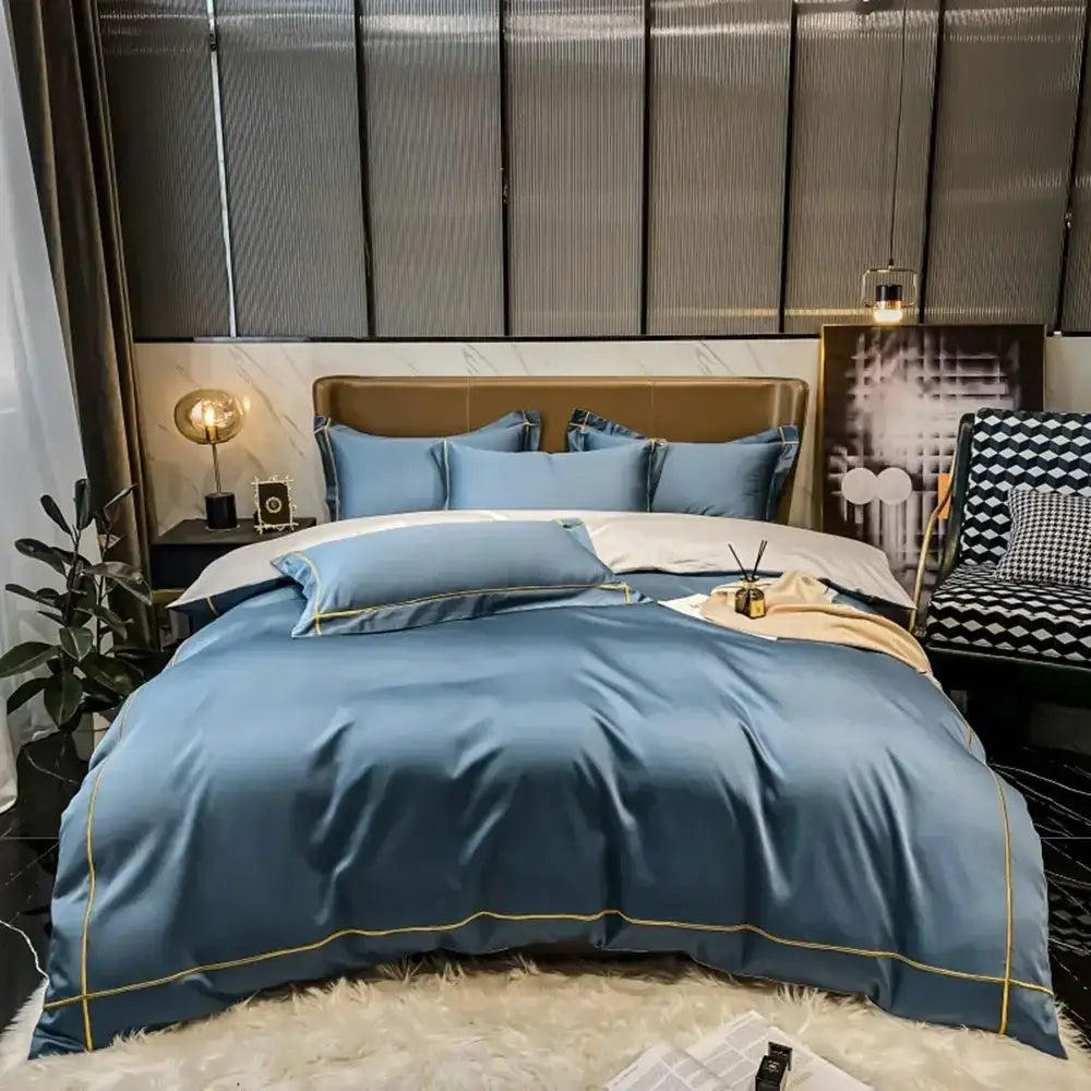 Blue satin egyptian cotton duvet cover with gold piping from decorbites luxurious embroidered bedding set