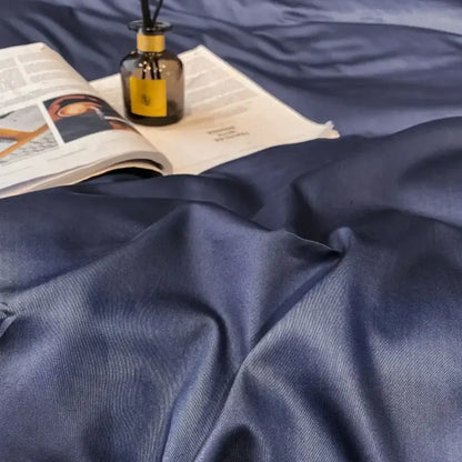Deep navy satin duvet cover with subtle ribbed texture from decorbites luxurious egyptian cotton bedding set
