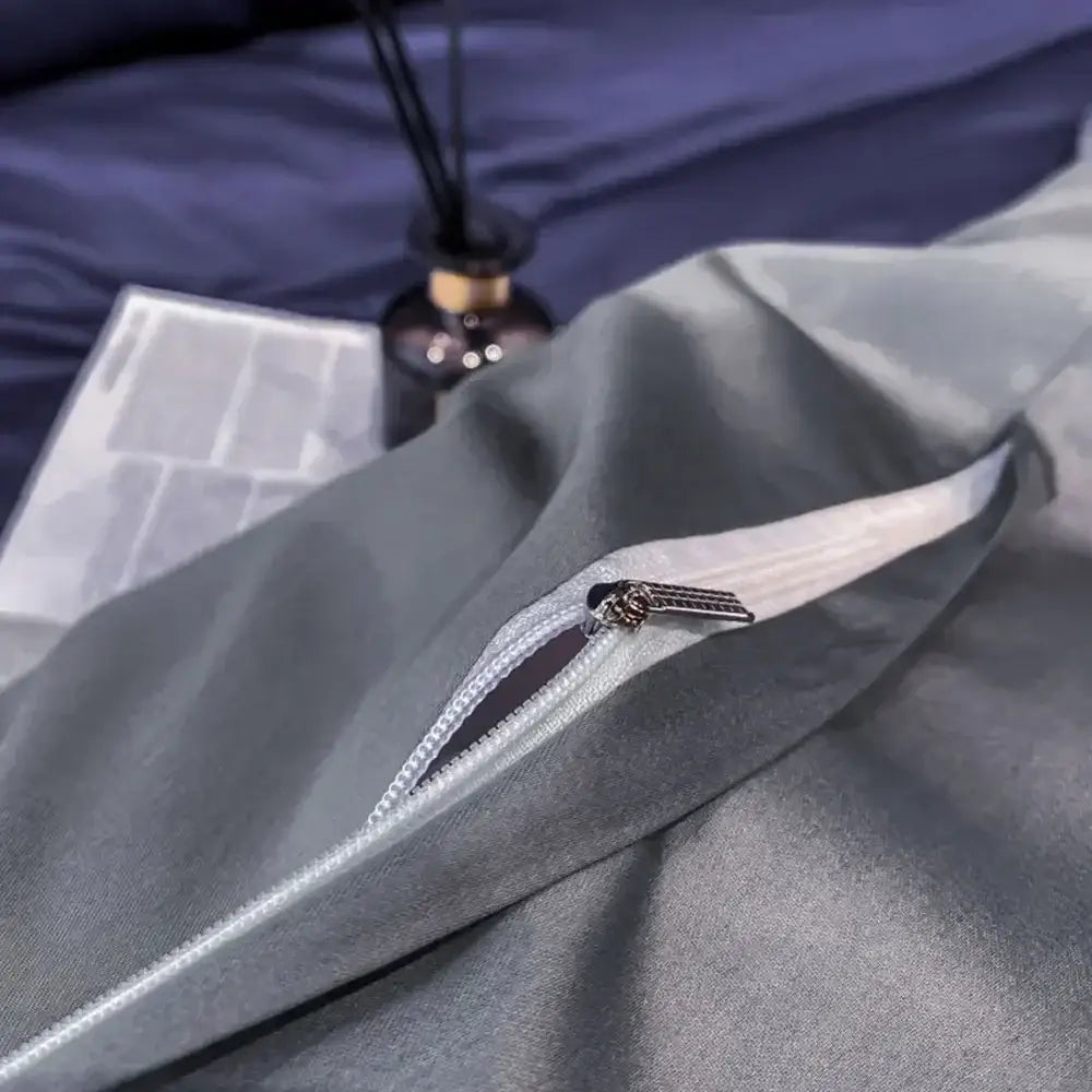 Gray satin egyptian cotton duvet cover with white zipper and metallic pull tab from decorbites luxurious bedding set