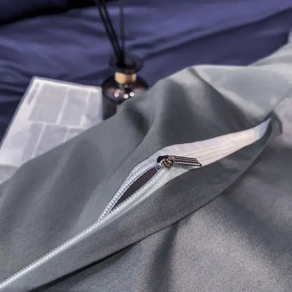 Gray satin egyptian cotton duvet cover with white zipper and metallic pull tab from decorbites luxurious bedding set