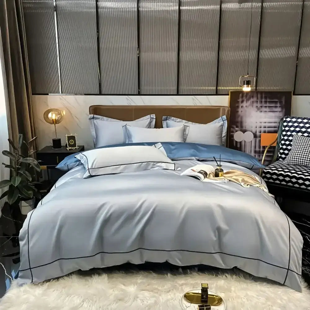 Light blue satin egyptian cotton bedding set with black piping detail from DecorBites™ luxurious embroidered duvet cover