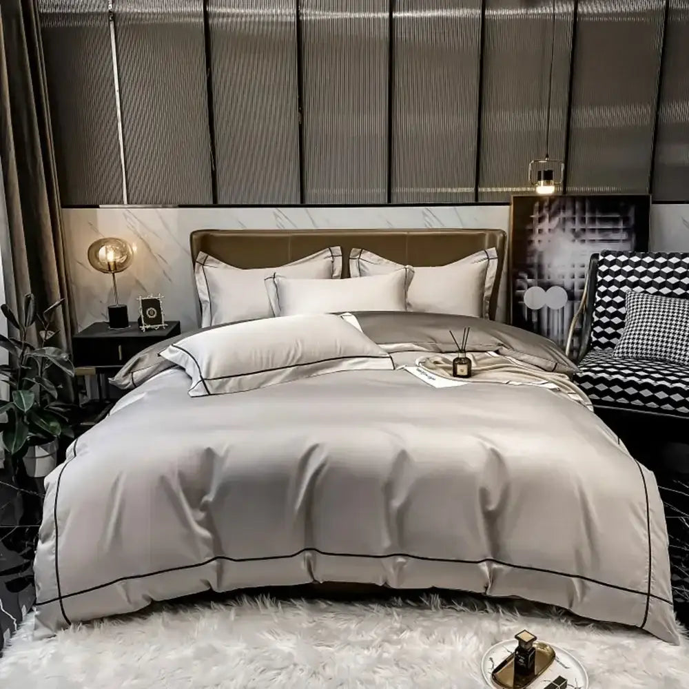 Luxury silver-gray satin egyptian cotton duvet cover bedding set with elegant black piping trim by DecorBites
