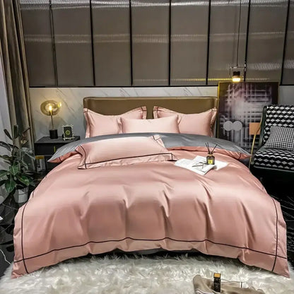 Pink satin egyptian cotton bedding set with black piping detail featuring a luxurious embroidered duvet cover