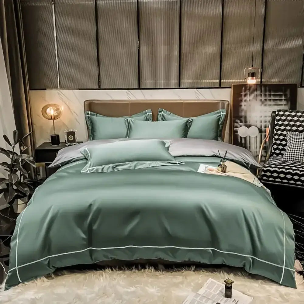 Teal satin four-piece bedding set with white piping made of luxurious egyptian cotton for duvet cover and sheets