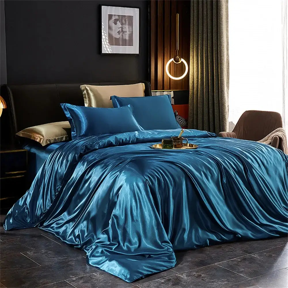 Decorbites™ luxurious silk bedding set featuring lustrous teal satin duvet cover with gold-trimmed accent pillows