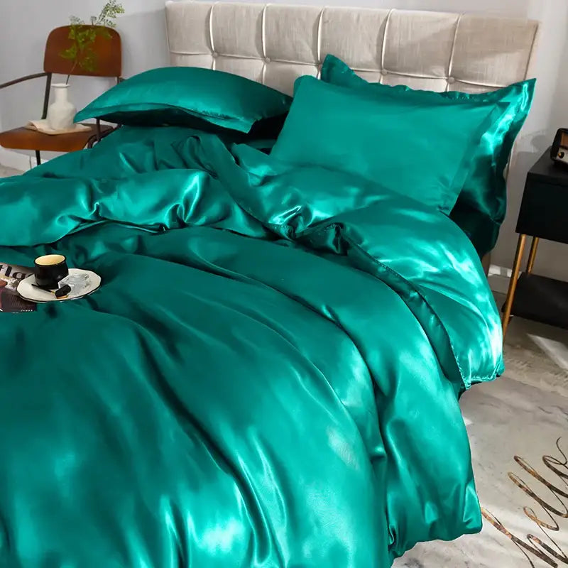 Emerald green satin silk bedding set from decorbites with a glossy luxurious finish available in multiple sizes