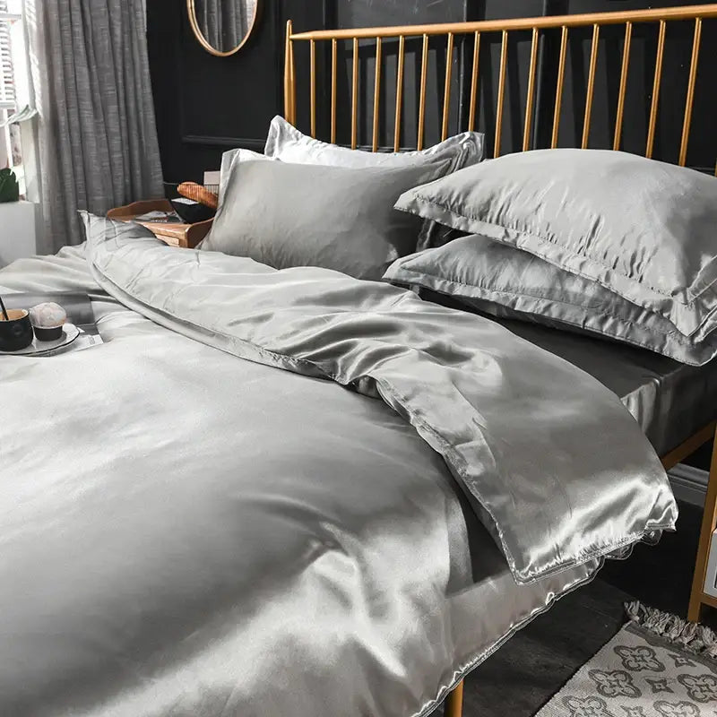 Silk-gray silk bedding set with smooth satin finish and elegant ruffled edges from decorbites luxurious collection