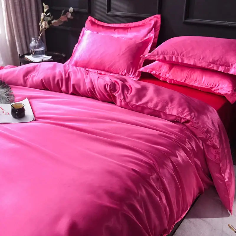 Decorbites™ luxurious silk bedding set in vibrant fuchsia satin with glossy smooth texture and matching pillowcases