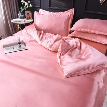 Pink satin silk bedding set with smooth glossy finish and matching pillowcases from decorbites luxurious silk bedding set